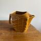 Glazed ceramic water pitcher