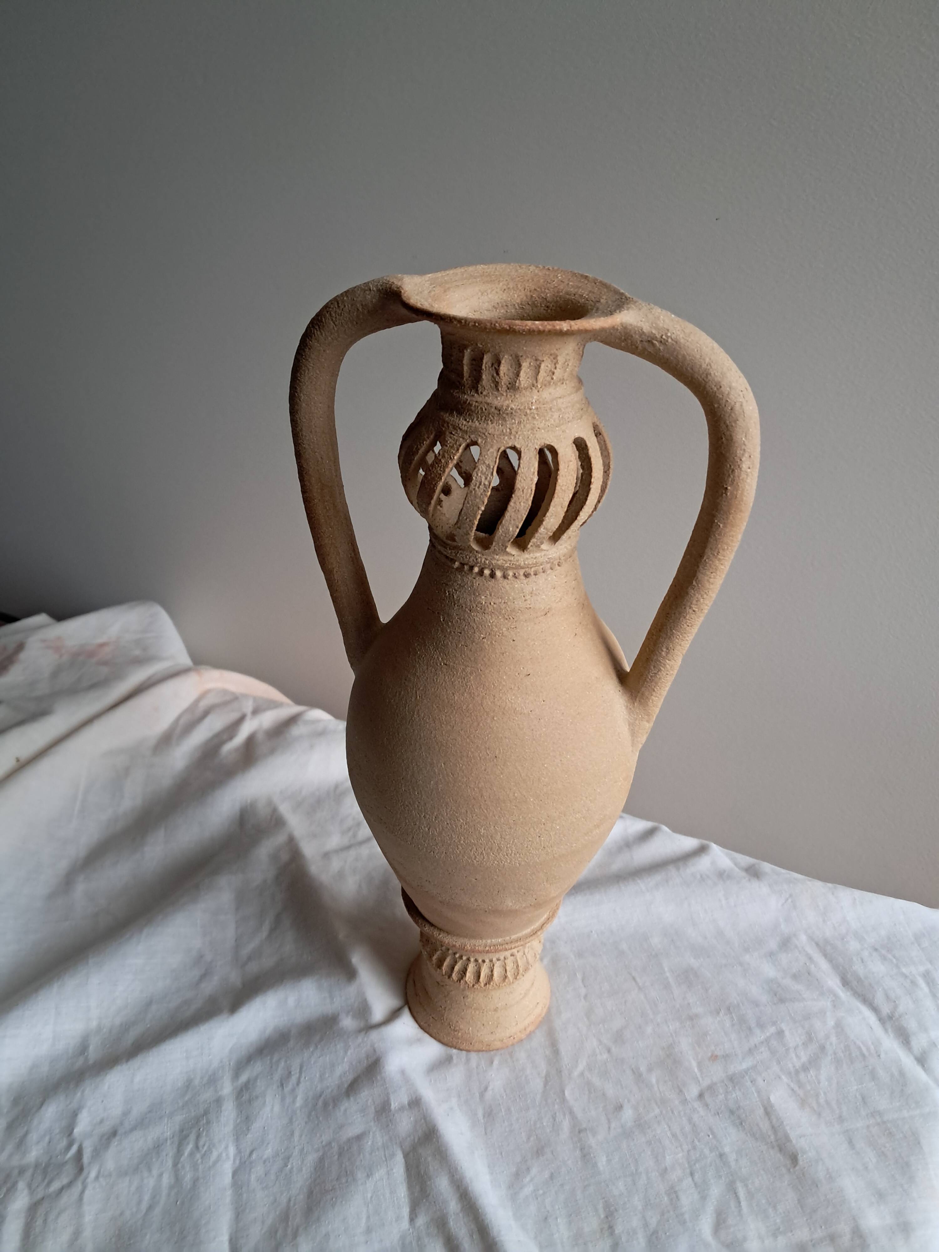 Large pierced stoneware vase