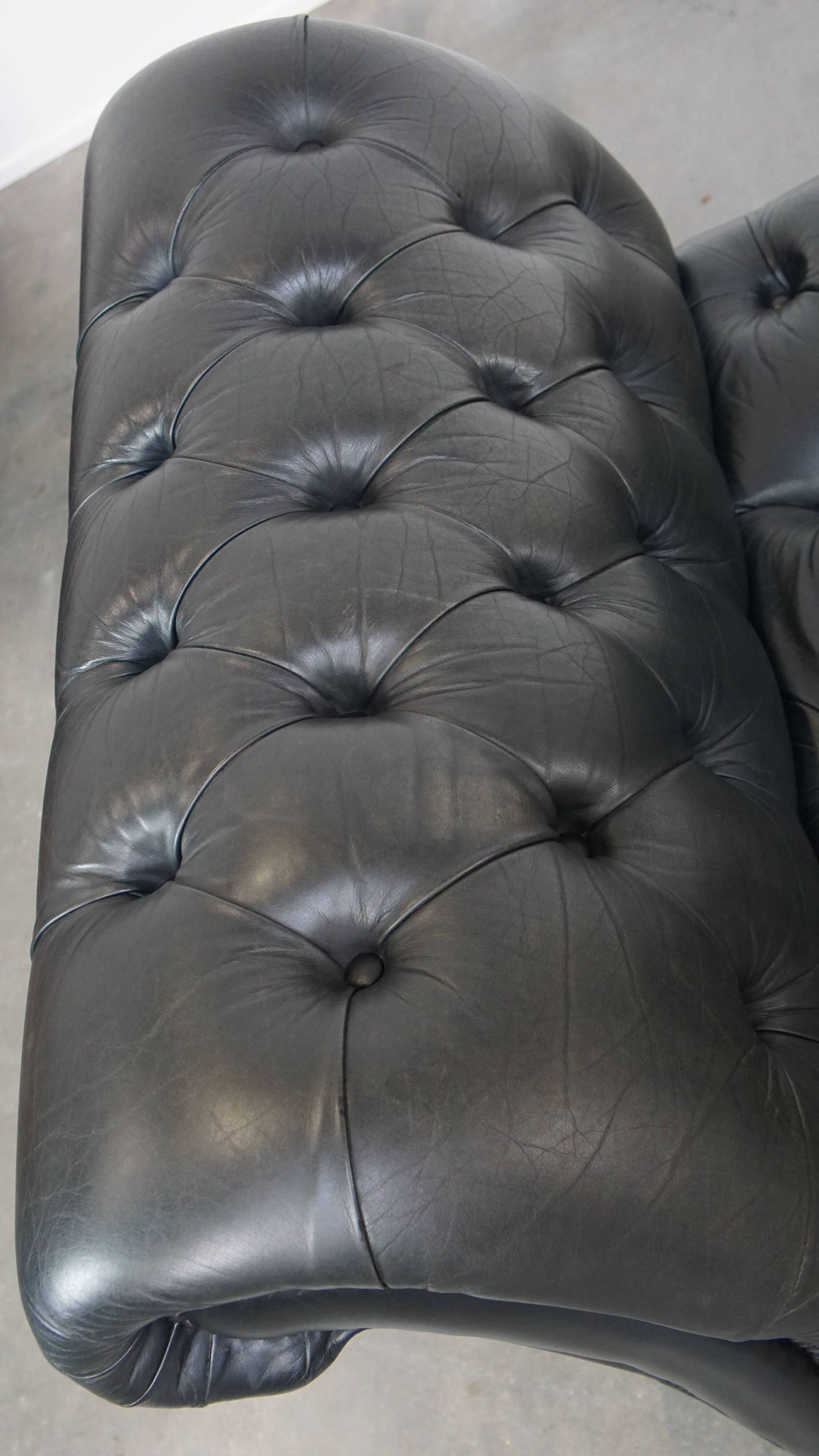 Black chesterfield daybed made of cowhide