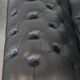 Black chesterfield daybed made of cowhide