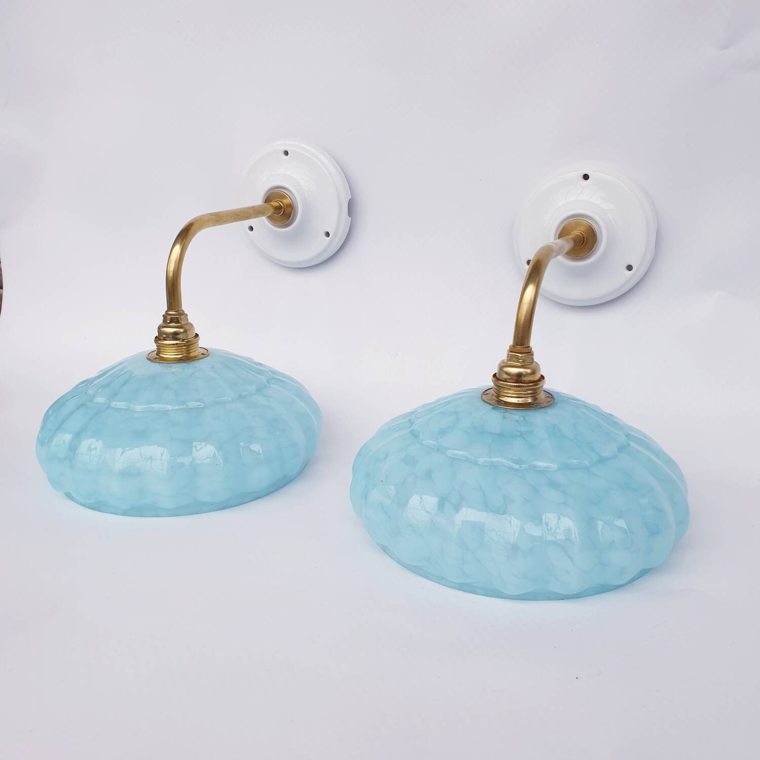 Swan neck wall lights and Clichy glass
