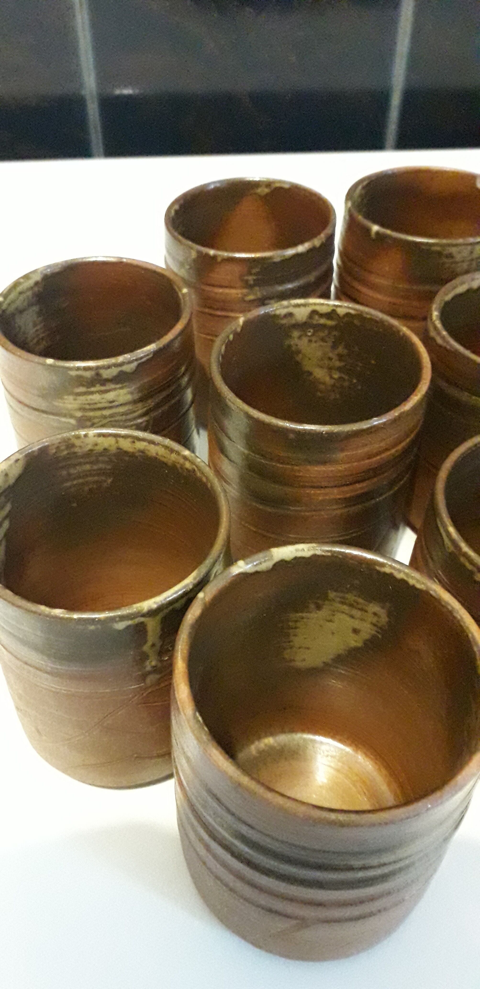 Set of 10 Japanese tea glasses in partially enamelled sandstone
