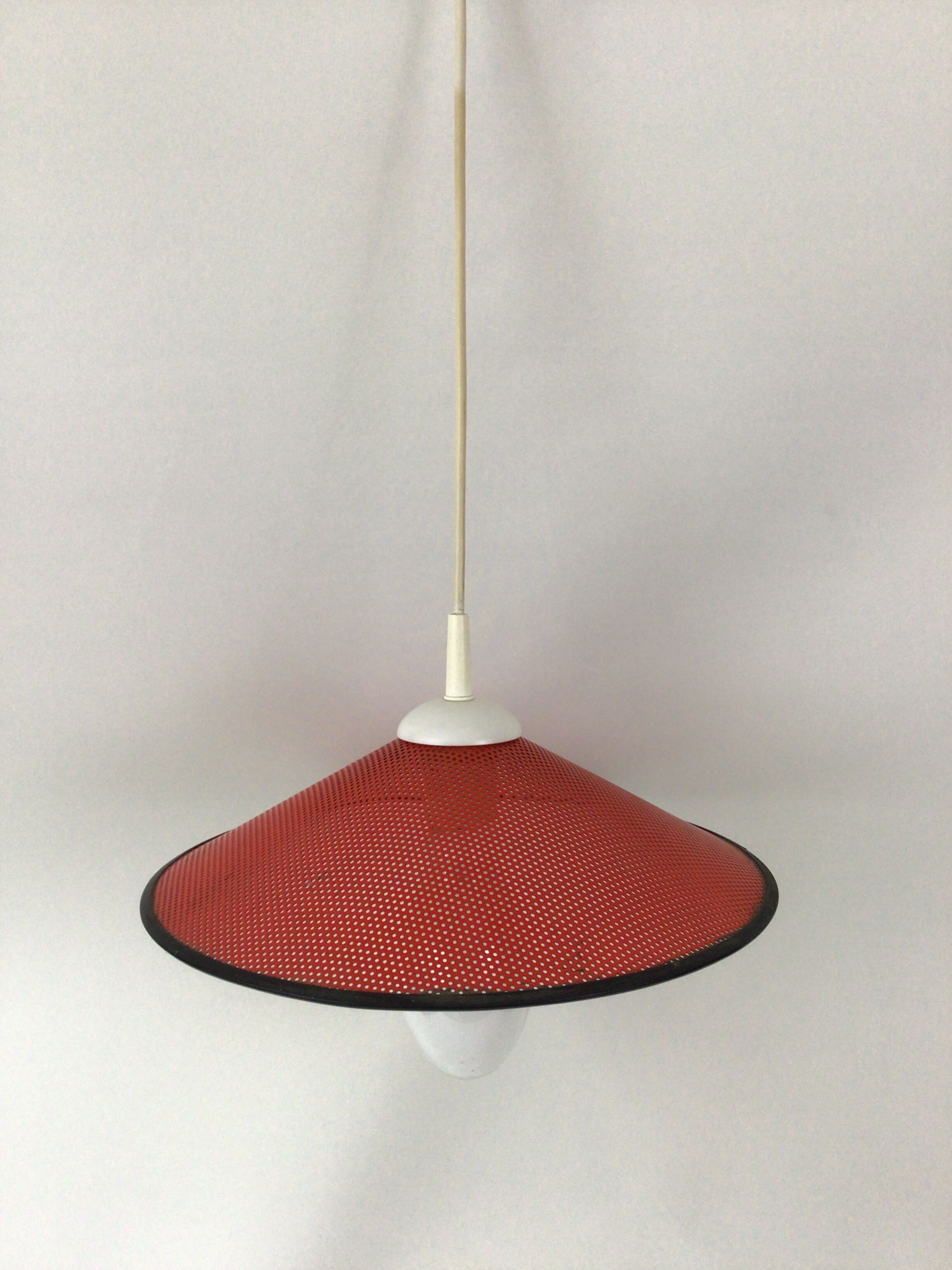 Perforated metal suspension