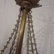 Antique balloon chandelier with pendants, in brass and with mouldings.