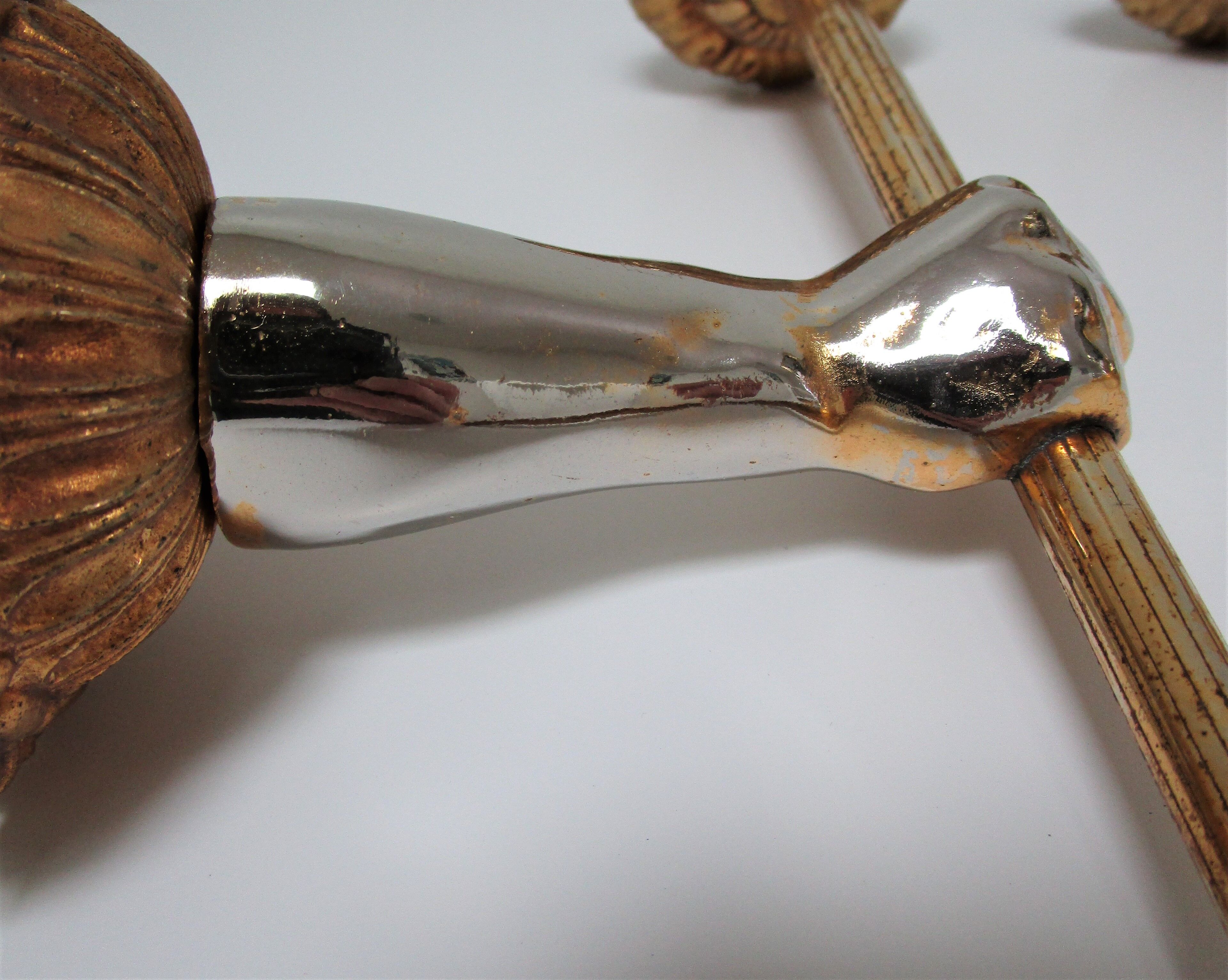 Pair of vintage patinated golden metal hand sconces