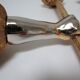Pair of vintage patinated golden metal hand sconces
