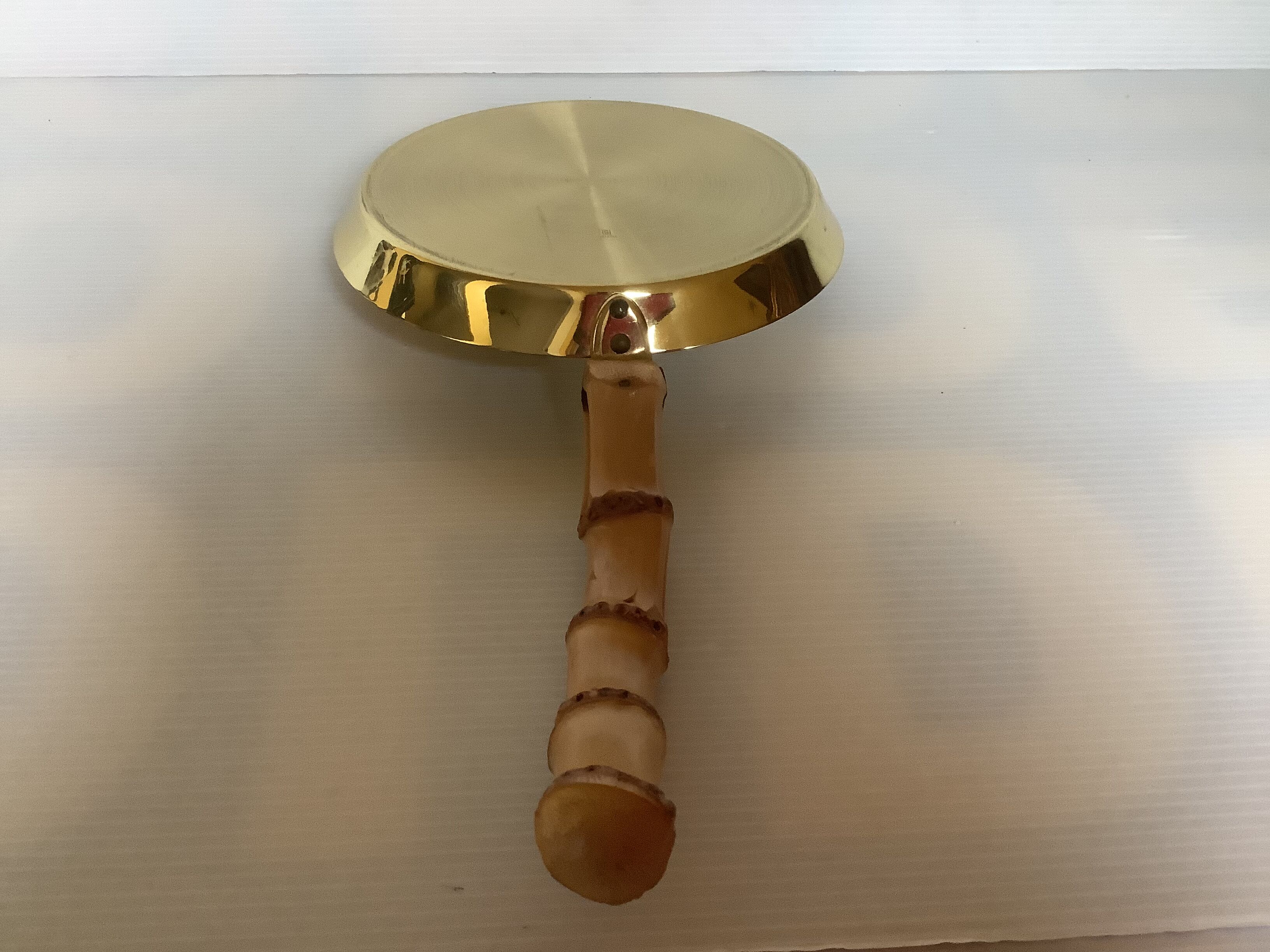 Grasoli Germany bamboo brass pocket emptier