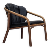 1970s, Danish armchair, rattan, black artificial leather.