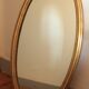 Miroir ovale en bois doré 80x42 cm