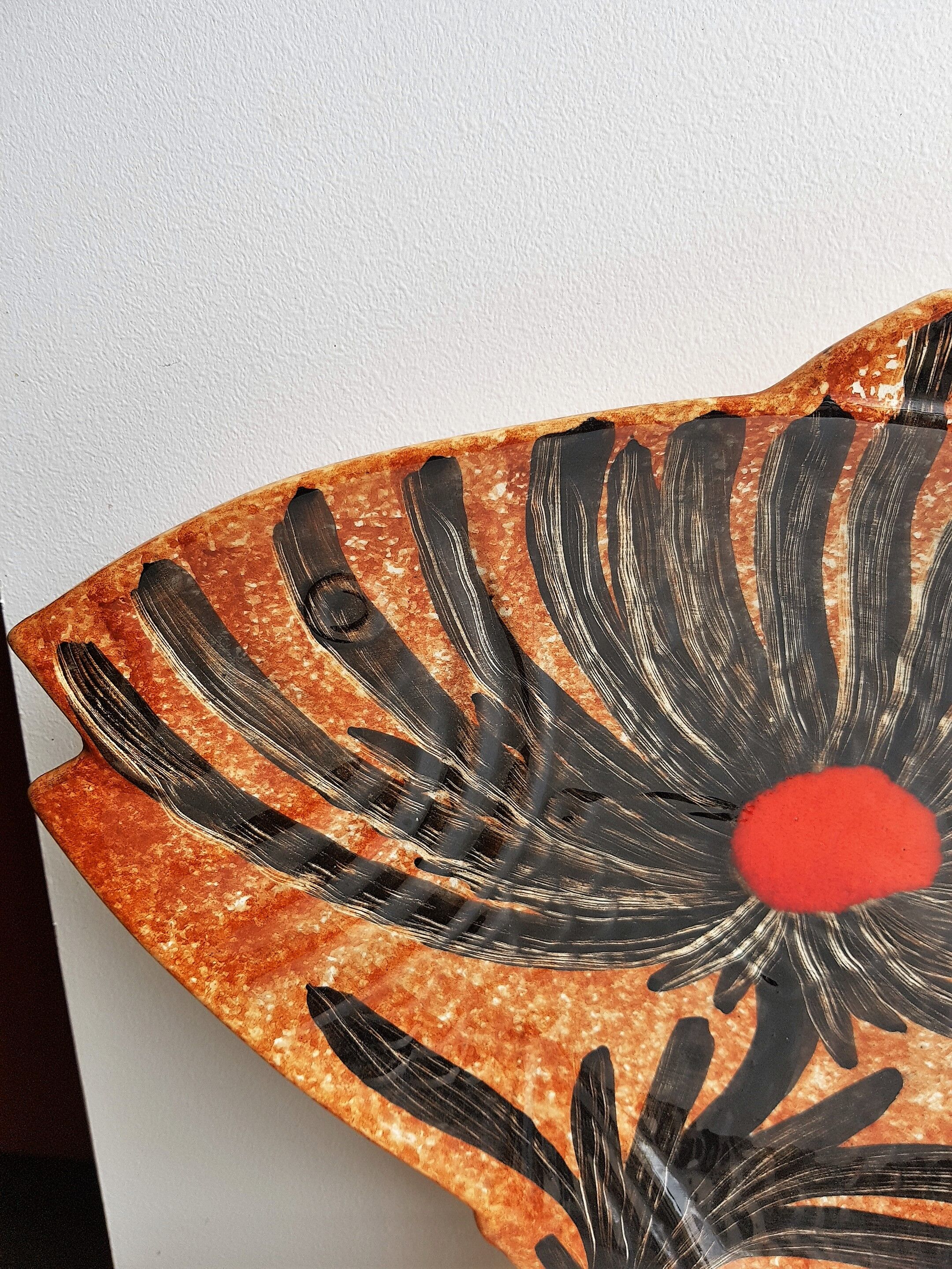 Ceramic dish in the shape of a fish.