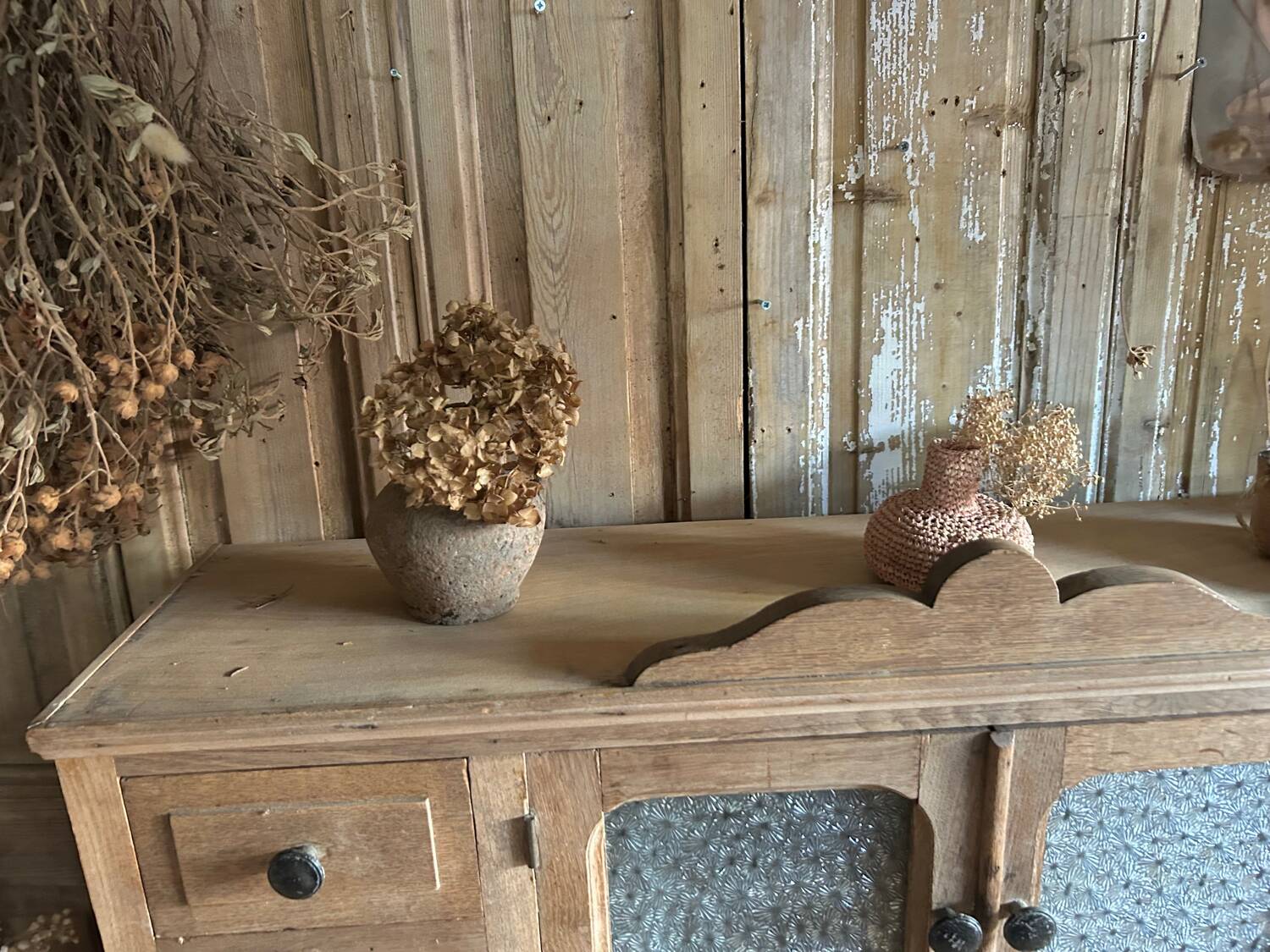Small piece of furniture with glass doors and drawers