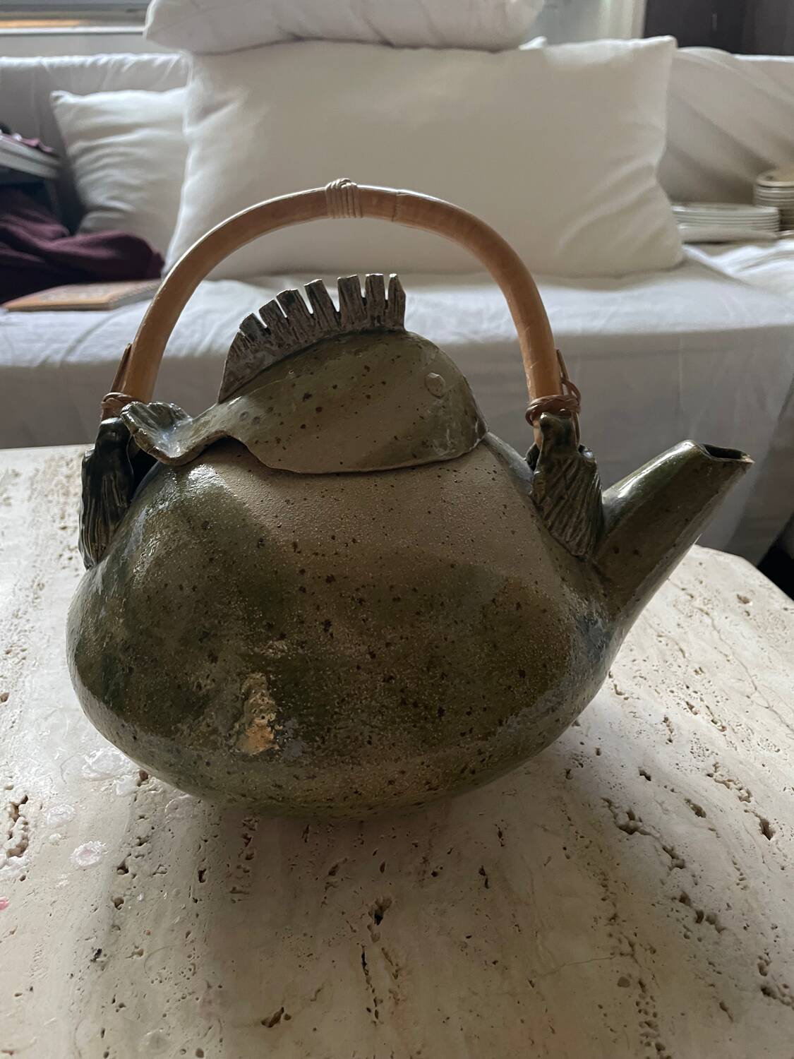 Handmade ceramic teapot with green fish and bamboo