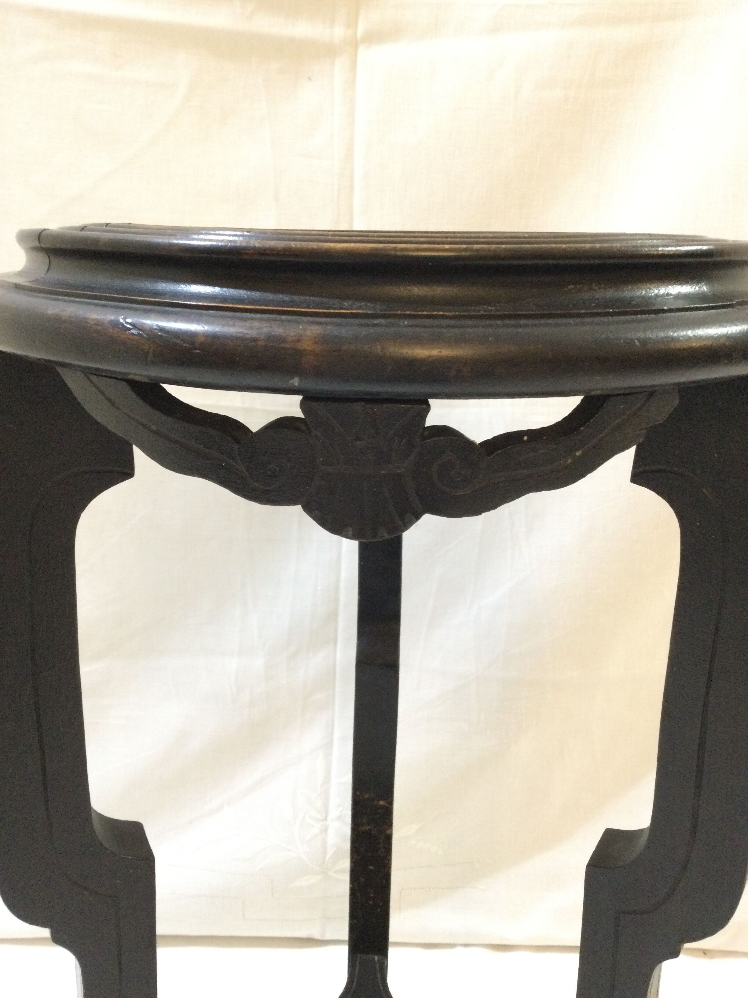 Blackened wooden and marble harness