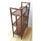 Dark rattan shelf