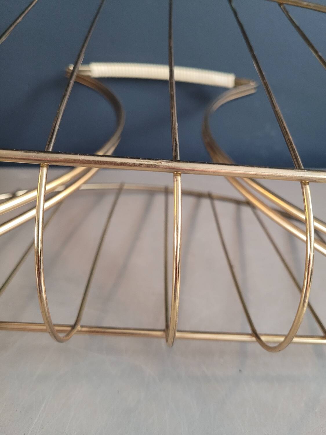 Vintage gold metal magazine rack