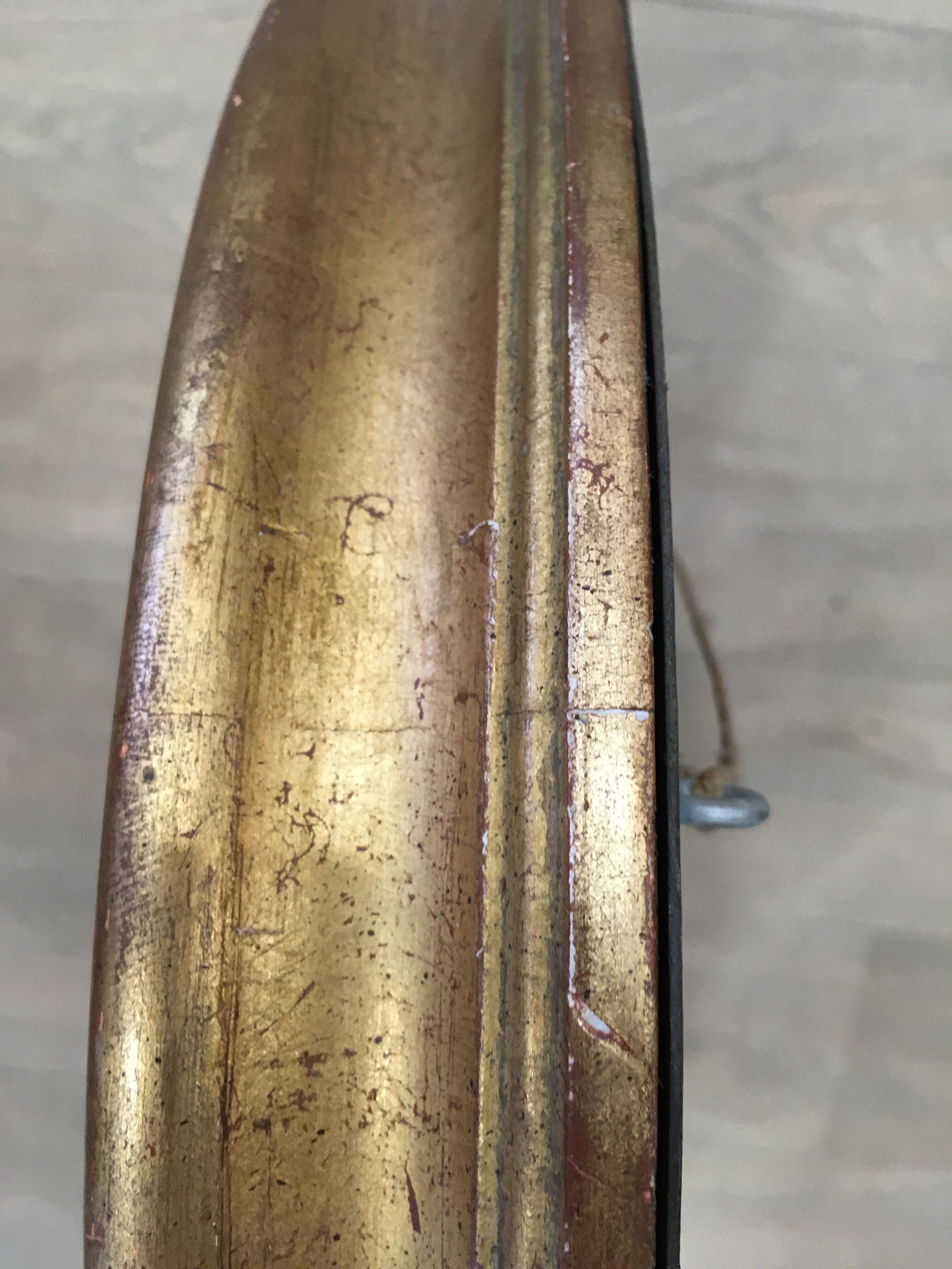 Old mirror gilded wooden frame.