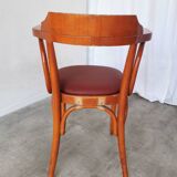 Fauteuil vintage en bois courbé : chaise de pub irlandaise en similicuir rouge des années 1970