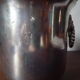 Cache silver metal pot with lion heads