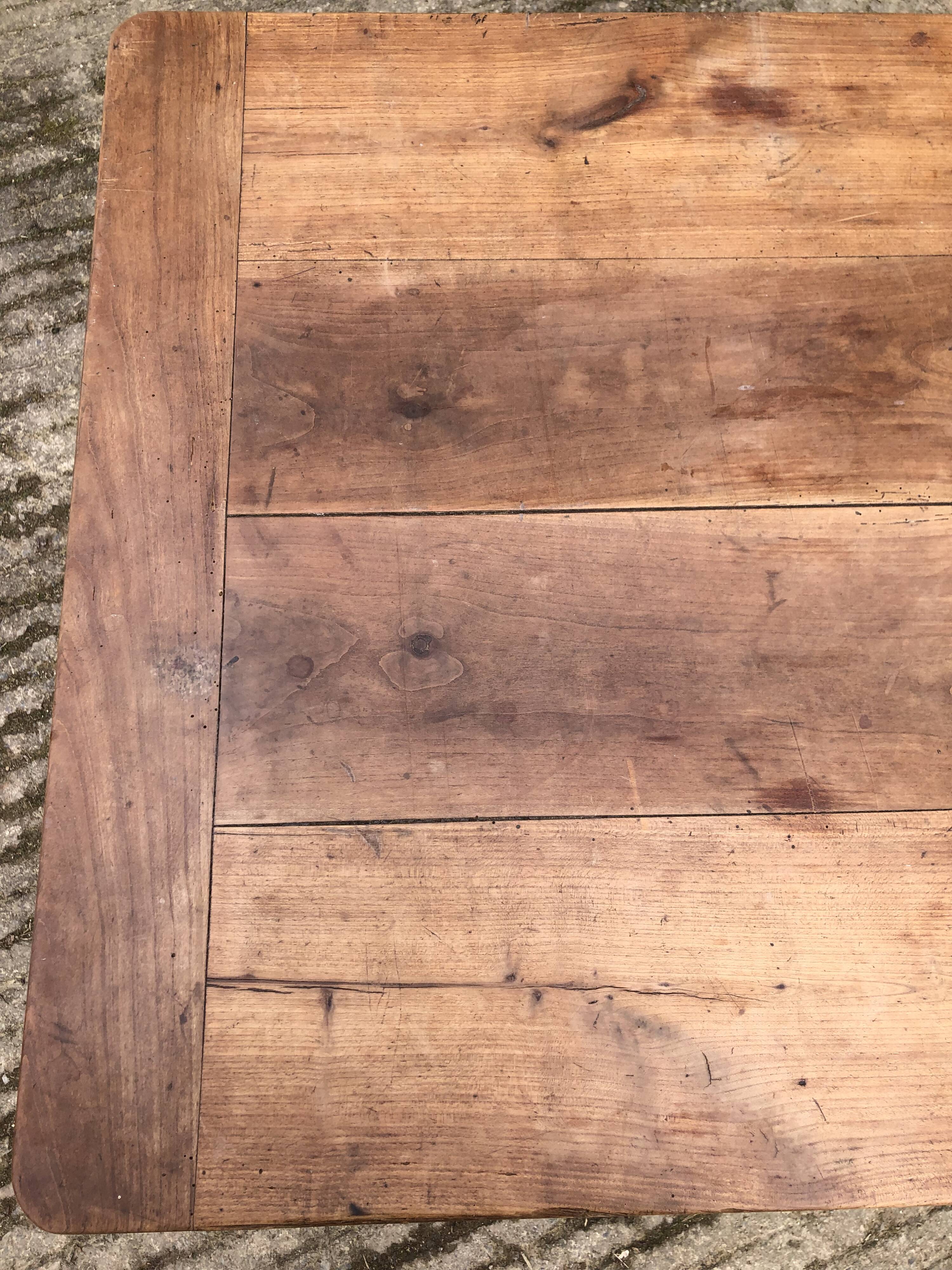 Antique cherry farmhouse table with 2 drawers and 1 pull-out