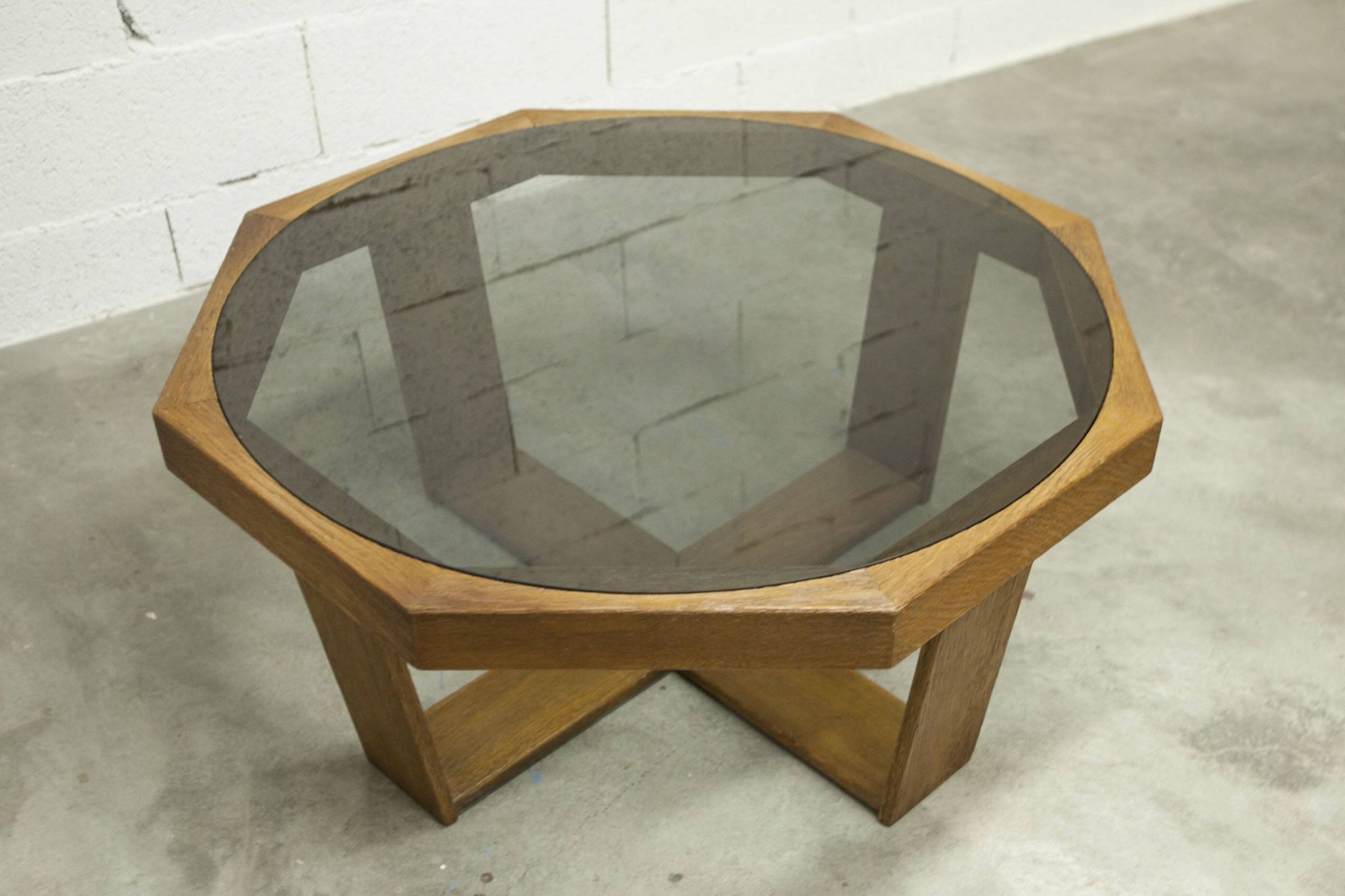 Unique hexagonal table 1977, smoked glass and oak, Swiss made.