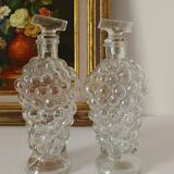 Pair of decanters with grape bunch XXth
