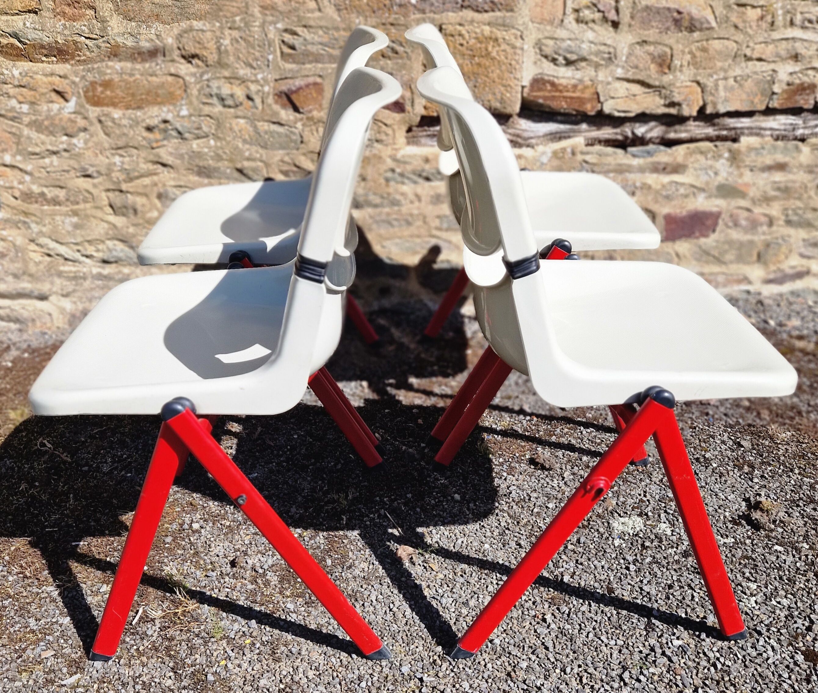 Set of 4 stackable Dorsal chairs by Ambasz and Piretti for OpenArk.