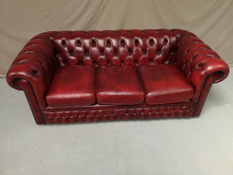 Red leather chesterfield sofa