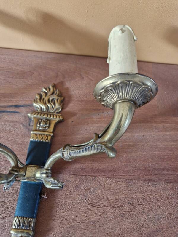 Pair of Empire style wall sconces in gilded bronze and green lacquer.