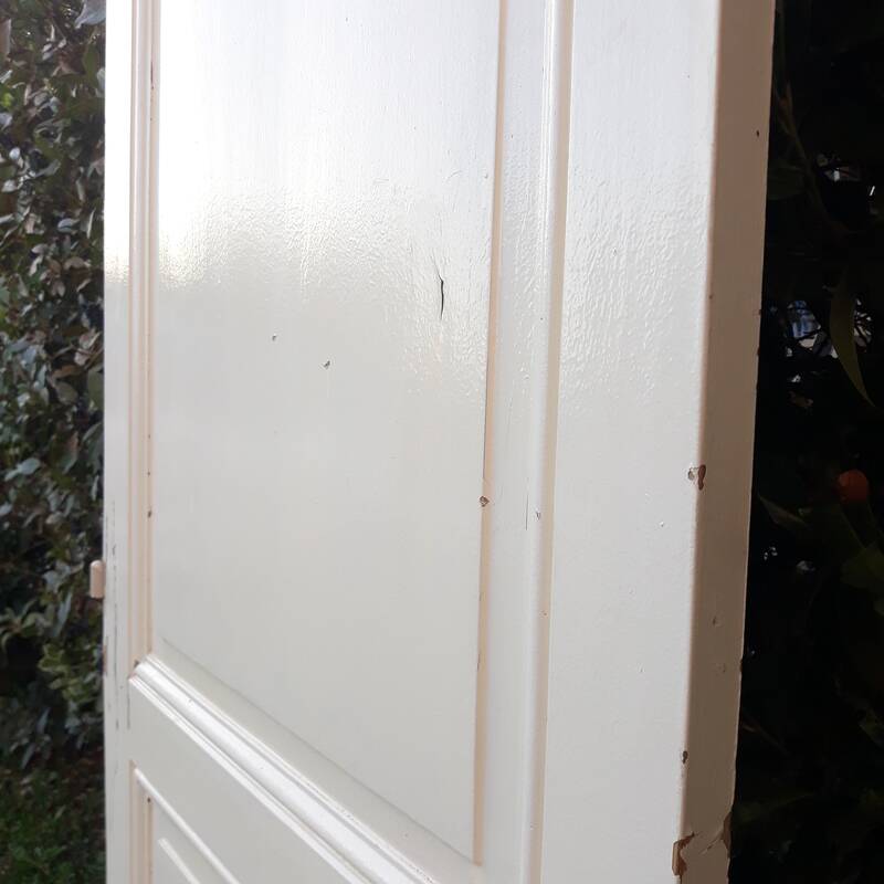 Communication door H220xW80.5cm, old panelled with moulding.