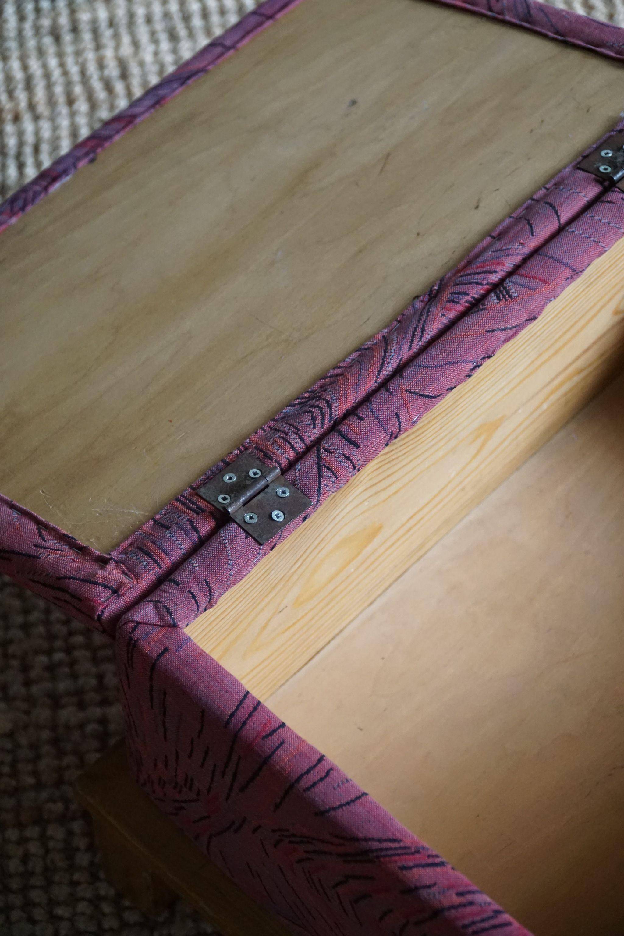 Sculptural French Art Deco stool with storage, reupholstered, made in the 1940s.