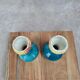 Pair of small antique bud vases numbered 396.