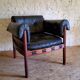 Armchair with vintage ottoman in black leather by Sven Ellekaer for Coja, 1970