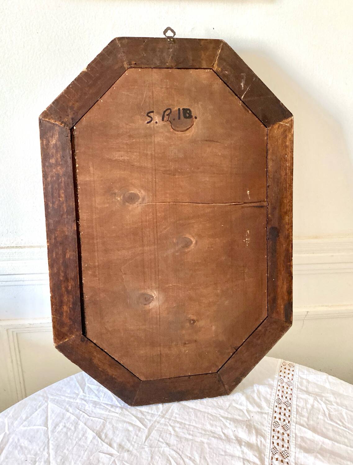 Vintage dark wood octagonal mirror