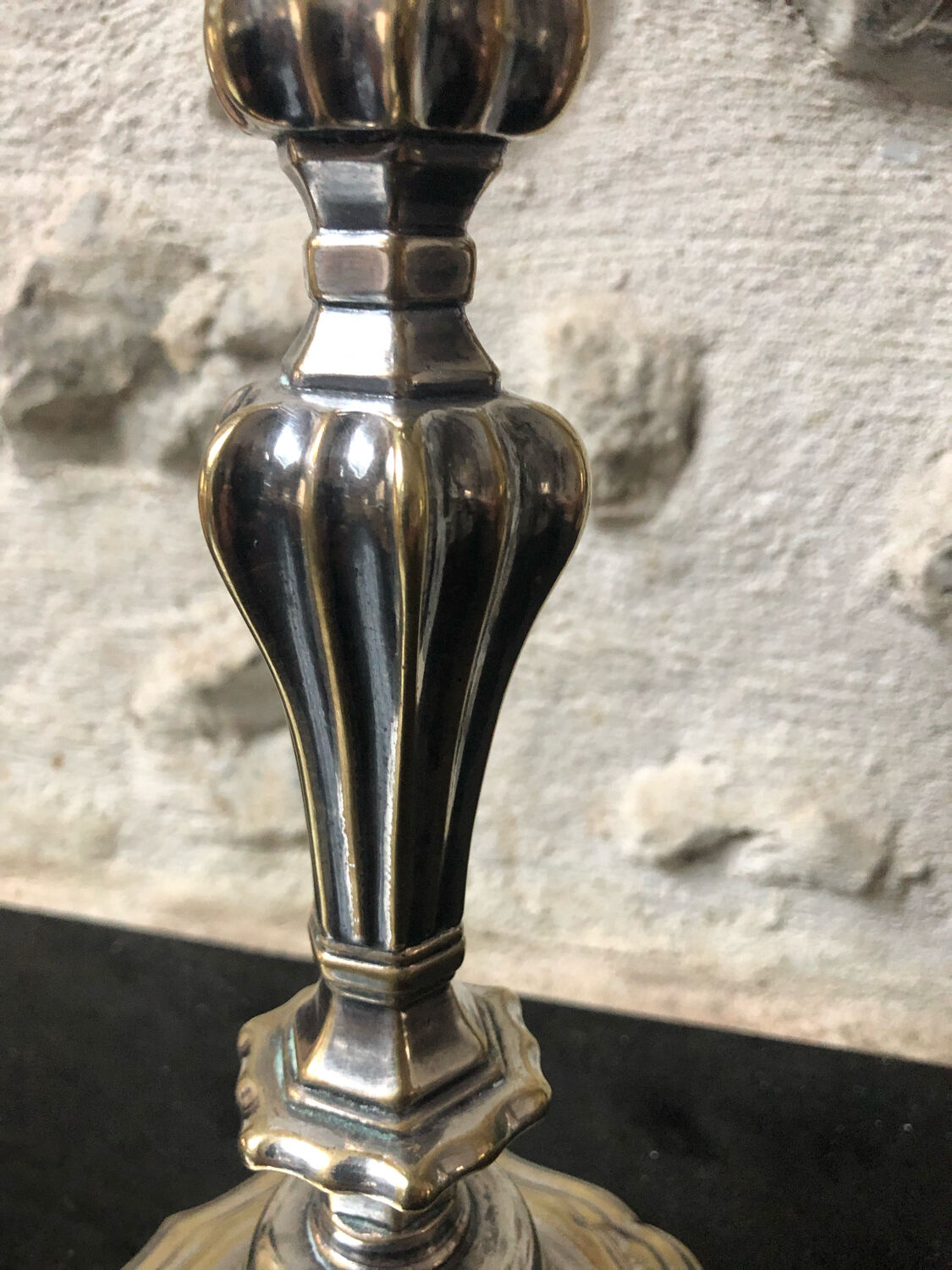 Antique candle holder in silvered bronze
