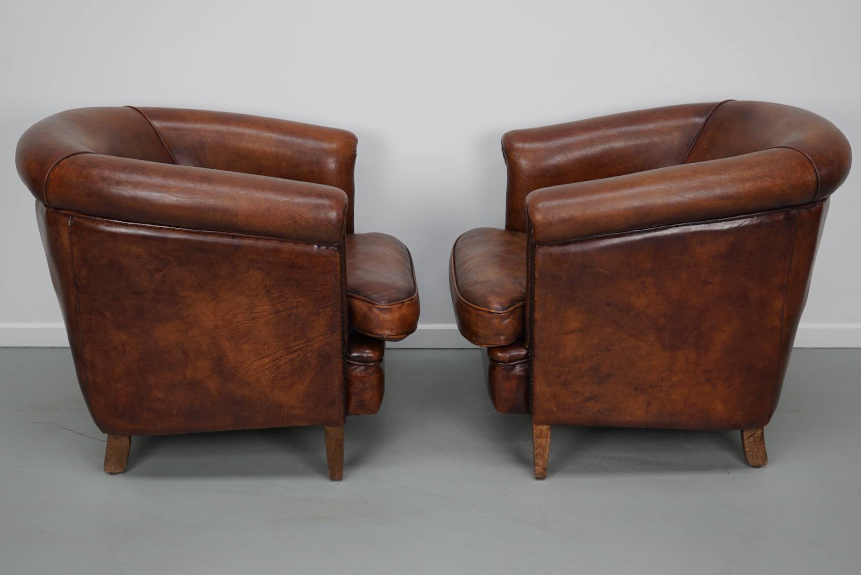Vintage Dutch cognac coloured leather club chair, set of 2 with footstool