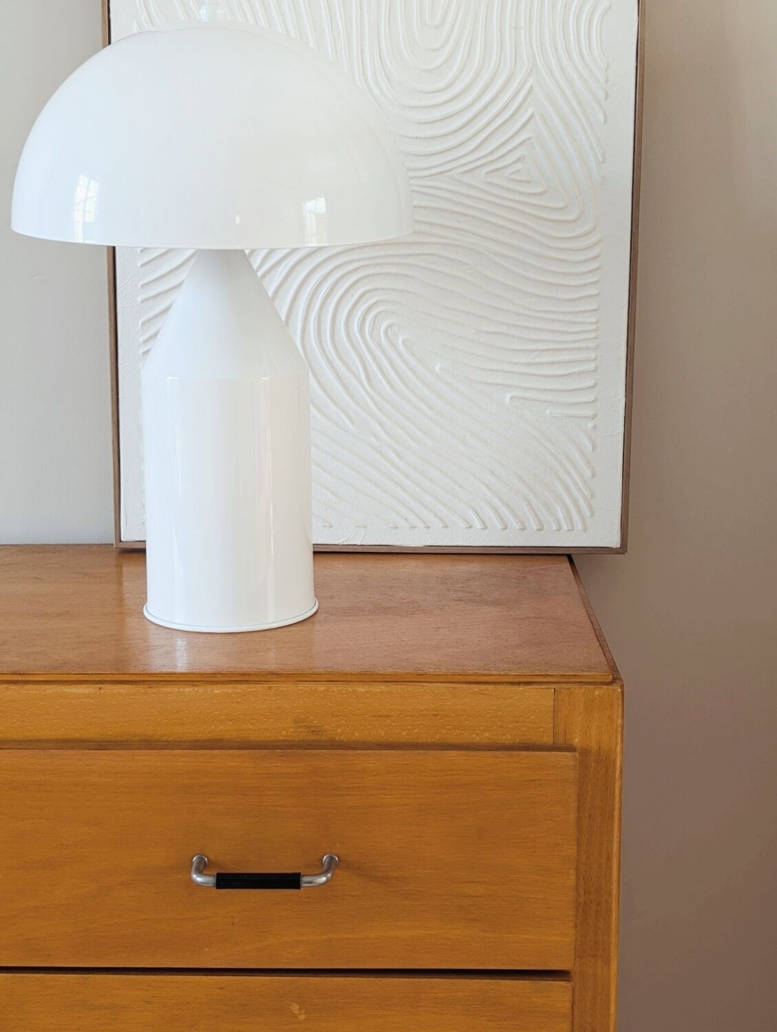Vintage chest of drawers with tapered legs from the 1960s.