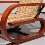 An exceptionally rare mahogany recliner crafted in Italy during the 1950s"