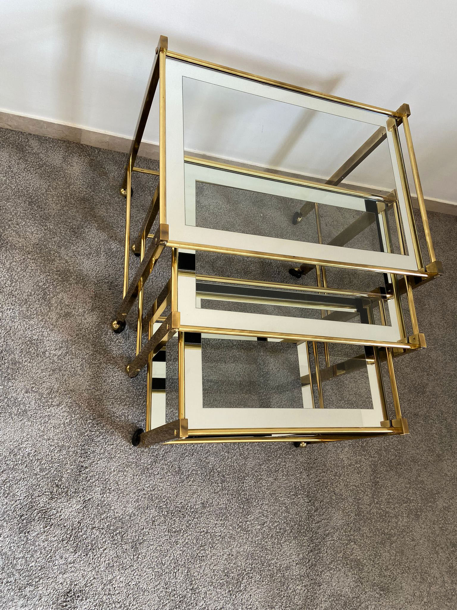 Trio of coffee tables "Nido" brass and glass Italy 70s