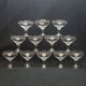 12 old champagne glasses in blown and engraved glass