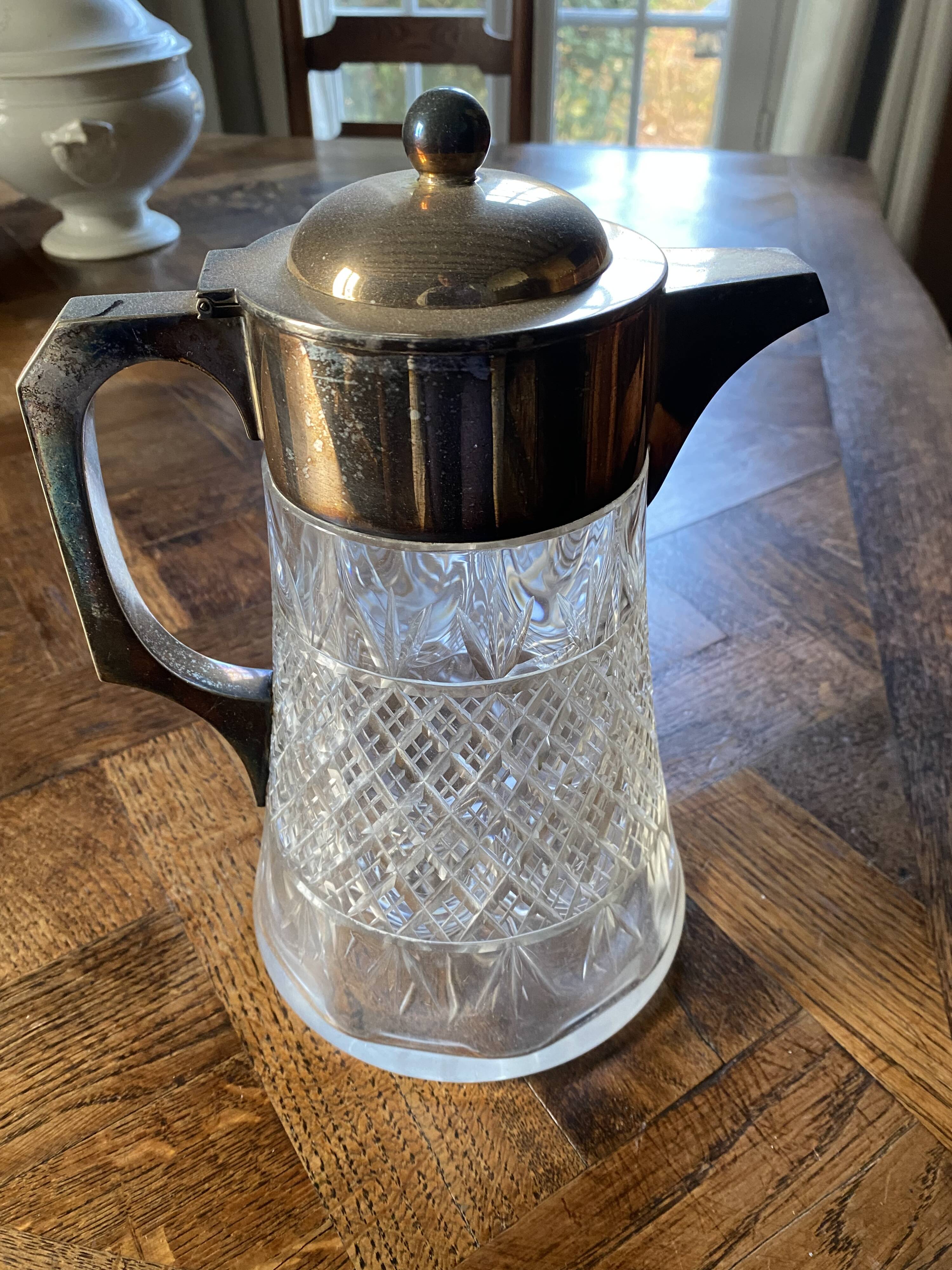 Glass and silver carafe