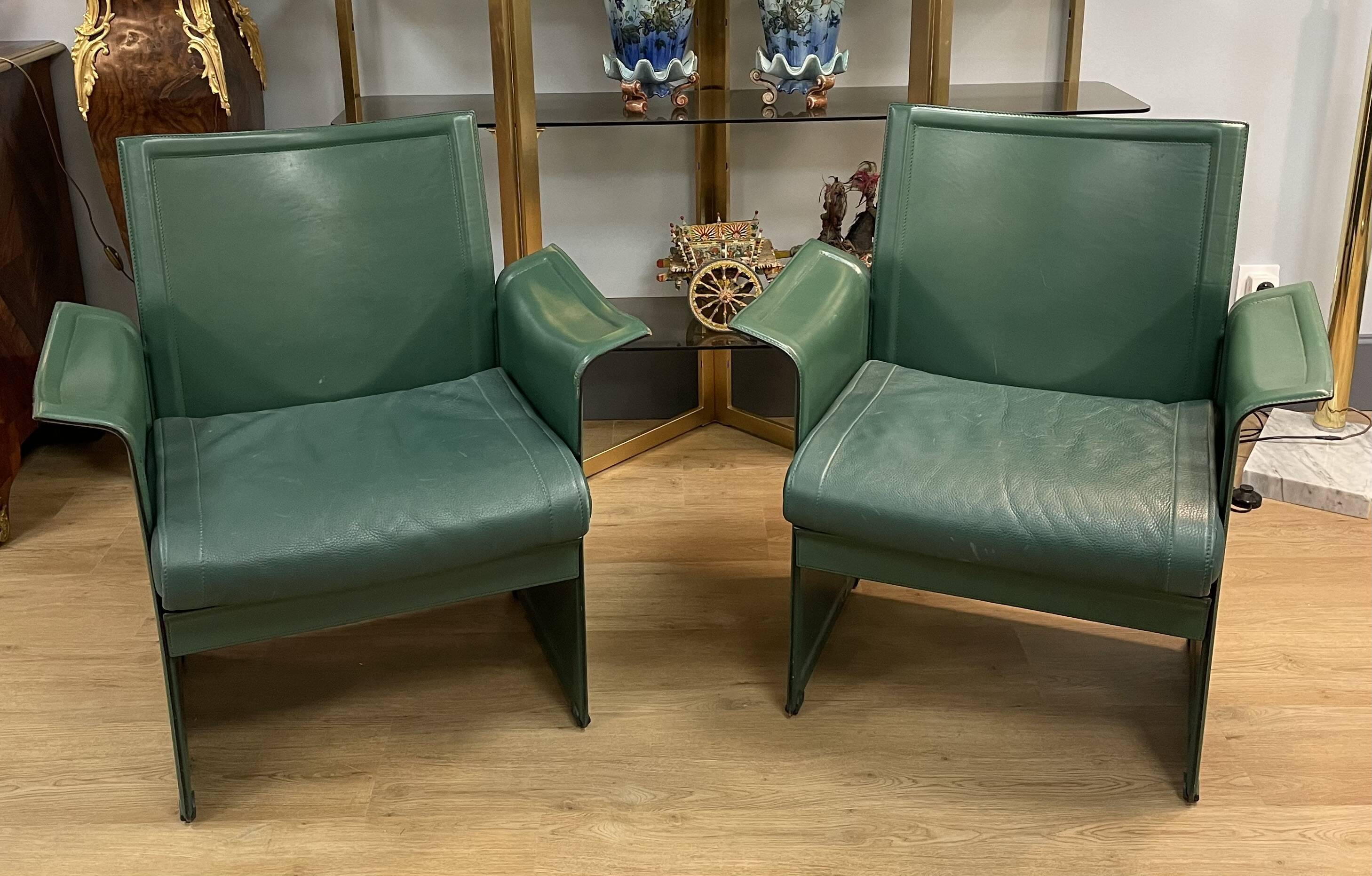 Pair of green leather armchairs from the 70s