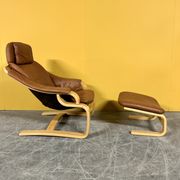 Danish vintage cognac leather armchair and footstool by Skipper Mobler