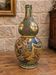 Satsuma époque Meiji : Vase gourde en céramique polychrome et dorée