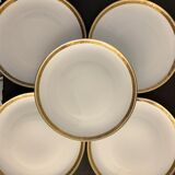 8 flat porcelain plates from Limoges Bernardaud, gilded Greek decoration, twentieth century