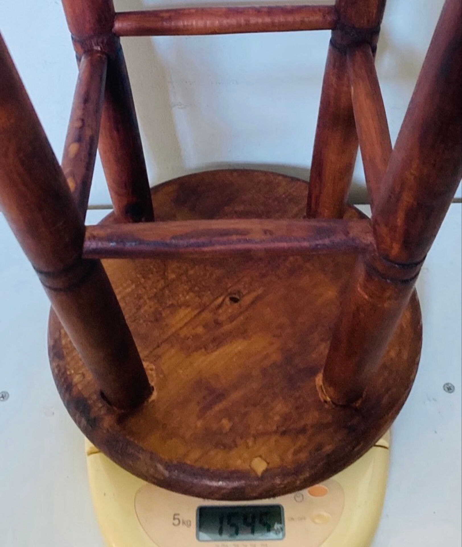 Vintage four-legged stool made of solid wood from the 1970s/80s.
