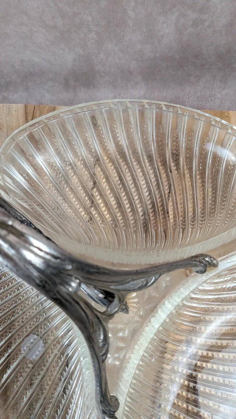 Vintage glass serving tray with silver-plated handle.