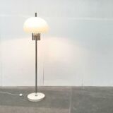 Italian space-style floor lamp from the 1960s with a stone base.