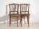 Pair of Thonet-style chairs in bent wood with turned spindles – Central Europe, circa 1920