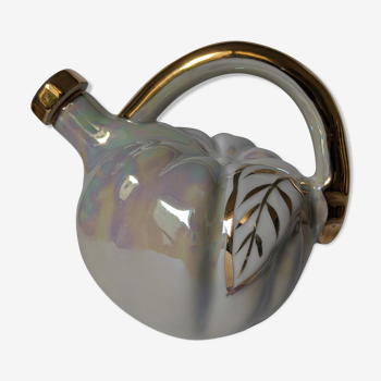 old bottle, iridescent white and gilded
