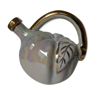 old bottle, iridescent white and gilded